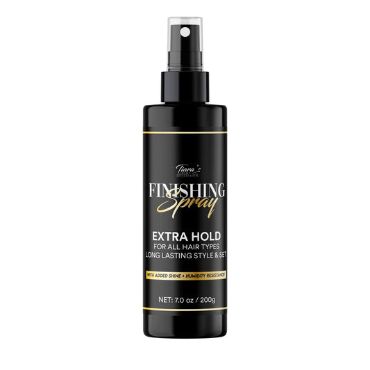 A black spray bottle with white and gold text labeled 'Finishing Spray Extra Hold' designed for hairstyling.